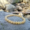 Kép 2/3 - Narancs kalcit karkötő 6 mm