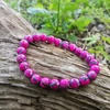 Kép 1/4 - Hematit pink sávos karkötő, színkezelt