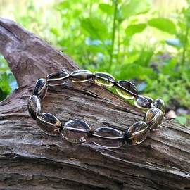 Füstkvarc karkötő ovális 14 mm